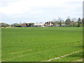 View across field to Pigeon House Farm in SP11 0SN