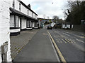 Looking east-northeast along the A487 through Eglwyswrw in SA41 3UJ