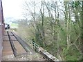 Northbound train crossing the Esk just north of Grosmont in YO22 5PB