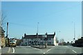 Road junction at the Holly Bush in LL12 9BQ