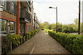 View down a cobbled path next to the flats on Mill Road in SG13 7AA