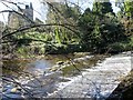Weir on River Nidd with Castlesteads beyond in HG3 5DG