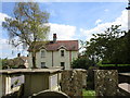 Churchyard tombs and cottage, Rowston in Rowston