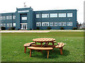 Picnic table and seats on the lawn of East Port House in NR30 3QW