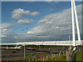 Suspension bridge over the M60 near Sale Water Park in M33 2NL