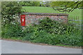 Postbox in wall around Whitton Court in SY8 3AD