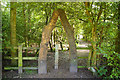 Archway into woodland below the visitors centre, Sale Water Park in M33 2NL