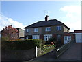 Semi detached houses on Lesbury Road (A1068), Hipsburn in Hipsburn