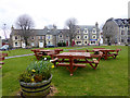 Picnic tables on Tomintoul Square in AB37 9HB