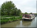 Fat narrowboat moored at Biss Aqueduct in BA14 8UA
