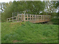 New bridge, Horsell common wetlands site in GU21 4XY