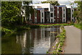 Modern apartments reflected in the Erewash Canal in Ilkeston in DE7 8GW