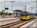Tram at Ashton West Metrolink Stop in OL7 9ET