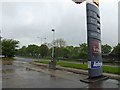 A wet Shell petrol station forecourt alongside the A63 eastbound in HU14 3HS
