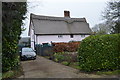 Thatched house, Low St in NR18 9QG