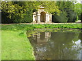 Mirror pond reflecting temple, Belton House in Belton and Manthorpe