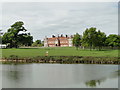 Helmingham Hall across the lake in IP14 6EW
