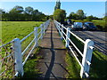 Raised walkway next to the A428 in Bretford in CV23 0LB