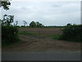 Field entrance and track off Bilstone Road in CV9 3PP