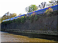 Railway embankment beside the River Thames in RG31 6SL