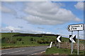 Road signs at junction of B7016 & Biggarshiels Road in ML12 6ZW