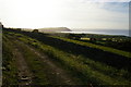 Dinas Island from track above Newport, looking towards the sunset in SA42 0QZ