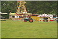 View of a tractor trundling around the St Albans Steam and Country Show in AL4 0HZ
