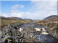 Boulder defences beside the Glascarnoch River in IV23 2PQ