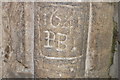 Graffito on Norman doorway, Mashbury church in CM1 4TF