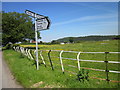 Signpost and Cheshire Railings in WA6 9DB