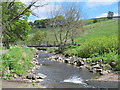 Ford and footbridge on the River East Allen near Low Huntwell in NE47 9UJ