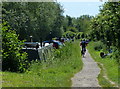 Cyclist heading south along the towpath towards Oxford in OX2 7UP