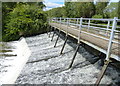 Footbridge and weir along the River Thames in OX4 4YA