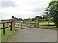 Gated entrance to Claydon Hall from Church Lane in IP6 0EL