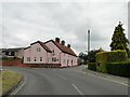 Pink cottages in Holly Lane, Rushmere in Rushmere St Andrew