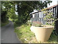 Plant pot and shed on Frogmore Hill in SG14 3RP