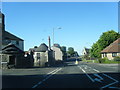 Neilston, with Parish Church on the left in G78 3HH