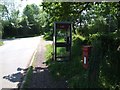 Post Box and Telephone Box at Junction in Themelthorpe in NR20 5PU