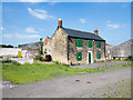 Boarded farmhouse at East Wideopen in NE13 6NS