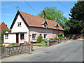 Pink cottages at Cross Street in Heckfield Green