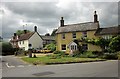 Green and houses, Broad Chalke in SP5 5DH