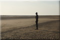 One of the iron men of Another Place on Crosby beach in L22 7RS