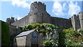 Some of the towers of Pembroke Castle from outside in SA71 4BS