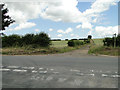 Farm track and footpath across Station Road at Rudham in PE31 8TF