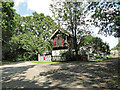 Raynham Park signal box in dappled sunlight in NR21 7BB