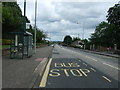 Bus stop and shelter on the A899 in EH52 5EB