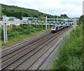 Train heading north along the Crewe to Derby railway line in ST6 4DS