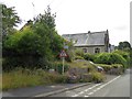 Bus stop and Methodist church in Yealmpton in PL8 2LU
