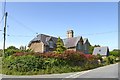 Hedges and houses at Battisborough Cross in PL8 1JT