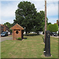 Water pump and bus shelter on small green, Stock in CM4 9QB